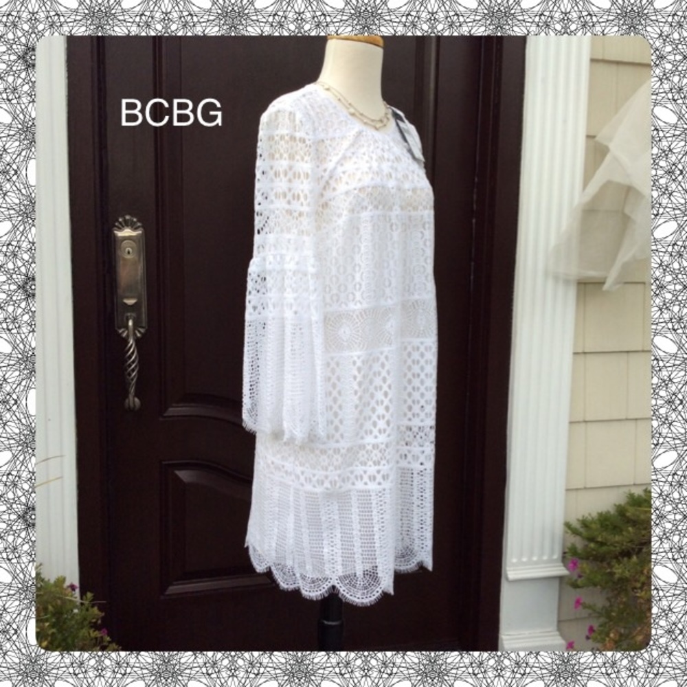 Chic New BCBG LACE Dress with Bell Sleeves.